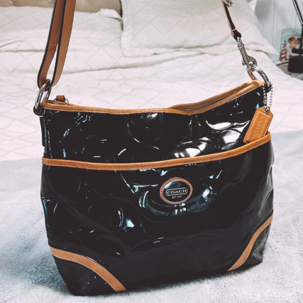 Coach embossed signature logo patent leather Peyton tote.